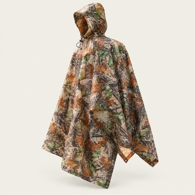 Studio view of Camo Field Poncho on a warm neutral background